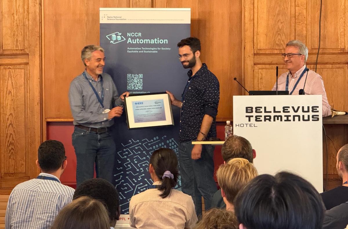 Panos receives his award