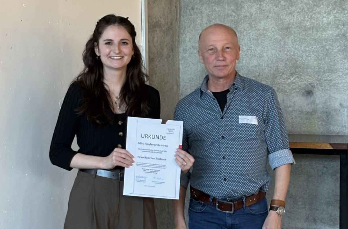 Sabrina collects her award