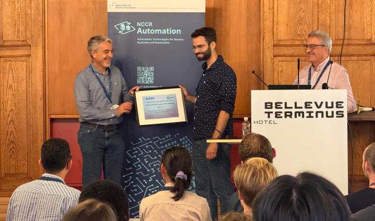 Panos receives his award