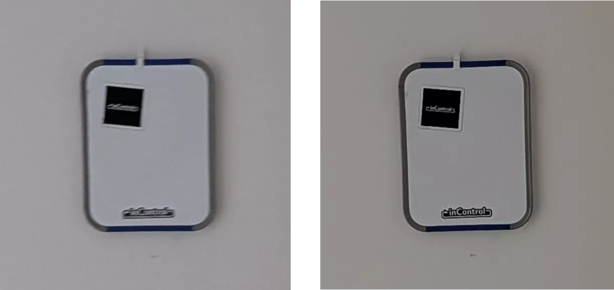 showing the same white-board with stickers on it twice. The first image is blurry, the second is clear.